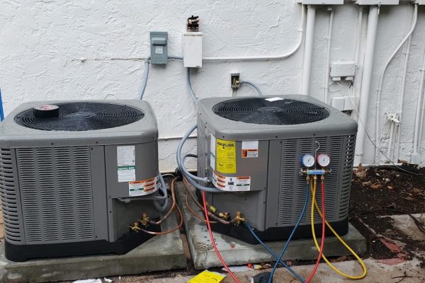 Central AC condenser unit installed outside a Florida home